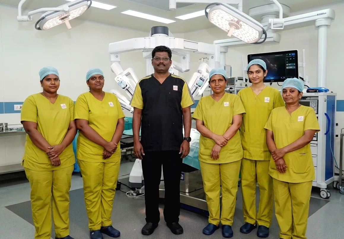 Dr. J. Saravanan with surgical team — Robotic OT, VS Hospitals